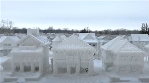 冬季风暴席卷北美：加拿大一社区被“冰封”变雪城