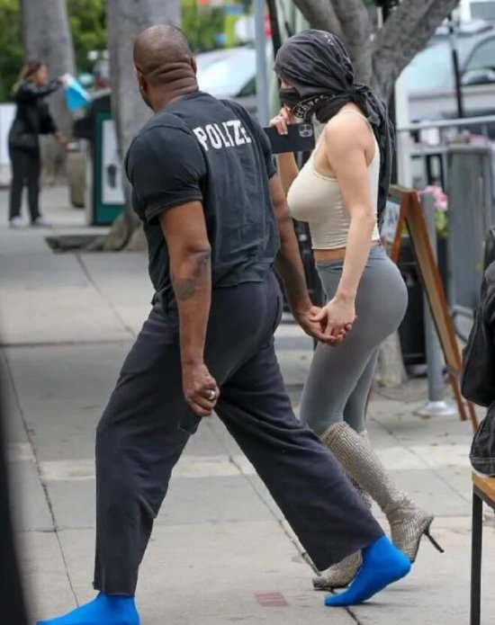 Kanye West and Wife Spotted in Los Angeles: Muscular Physique and Eye-catching Blue Shoes